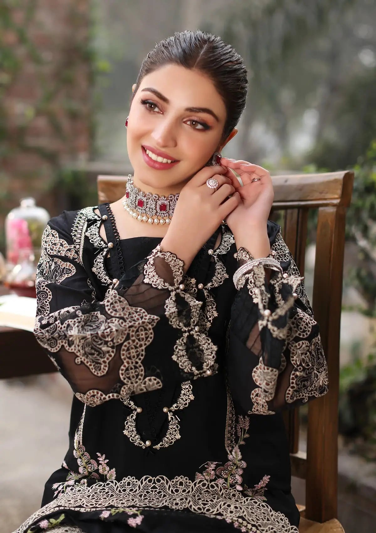 NOOR, CLOSEUP IMAGE OF Embroidered Lawn Front Side Panel and Embroidered Organza Sleeves Border.