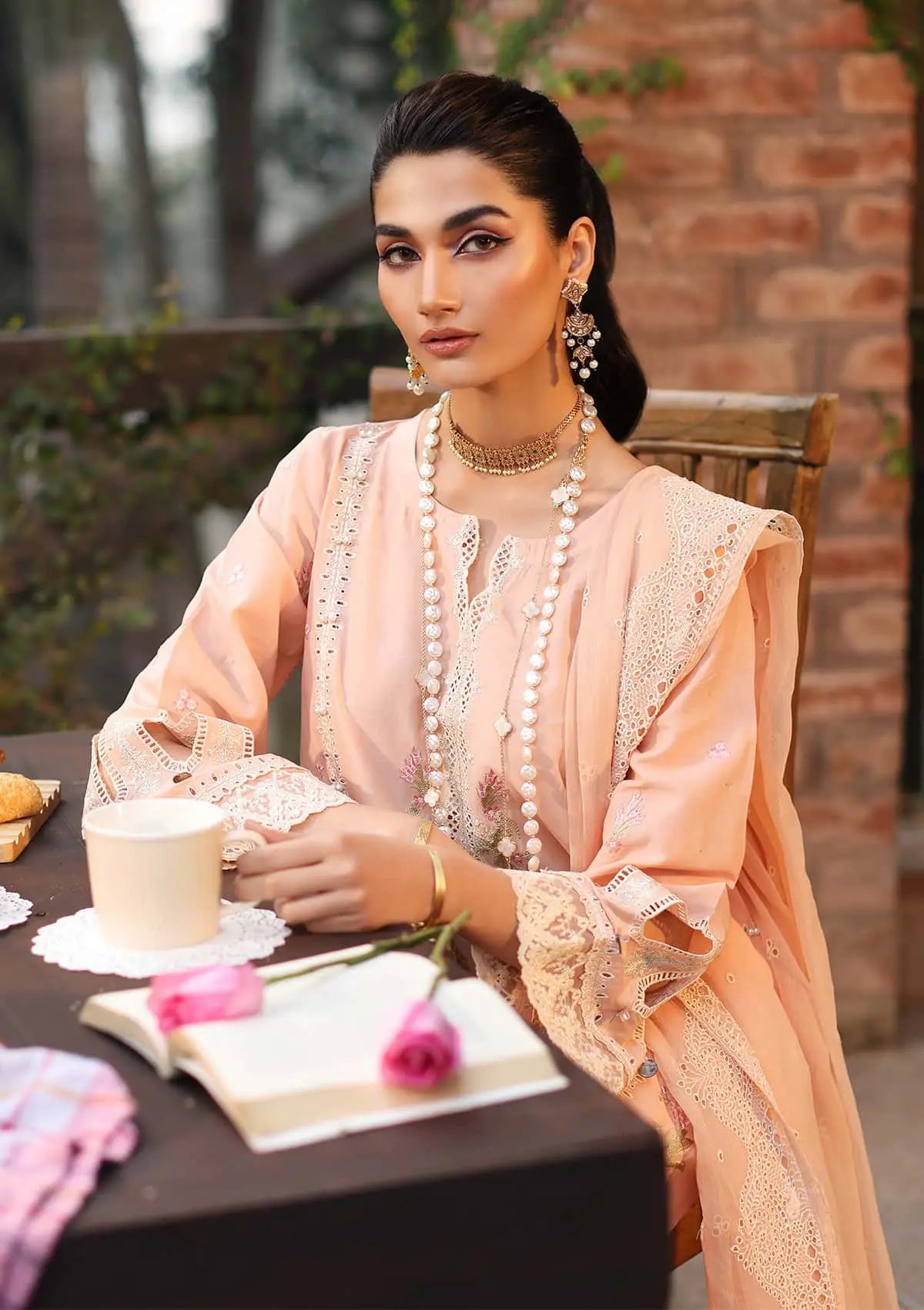 Close up image of MAAHRU beautiful Embroidered Lawn dress from KAHF's "Festive Lawn" 2024 Collection.